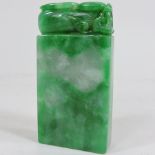 A reproduction jade coloured hardstone seal,