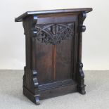 A Victorian carved oak lectern,
