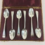 A matched set of six George III silver teaspoons, with bright cut decoration,