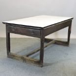 A 19th century kitchen table, with a later white enamel top,