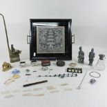 A collection of oriental items to include an ebonised tray, 34cm, a metal opium pipe,