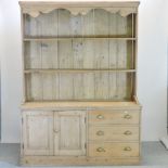 An antique pine dresser,