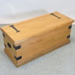 A handmade pine blanket box,