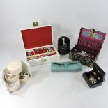 A collection of costume jewellery, to include brooches,