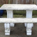 A reconstituted stone white painted garden table, 130 x 80cm,