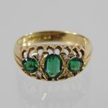 An 18 carat gold green sapphire and diamond ring,