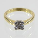 An 18 carat gold princess cut single stone diamond ring, approximately 0.