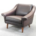 A 1960's Danish brown upholstered armchair