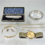 A 9 carat gold flexible bracelet, together with a silver handled fruit knife, cased,