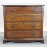 A 1920's mahogany serpentine chest of drawers, on bracket feet,