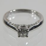 An 18 carat white gold solitaire Forever ring, approximately 0.