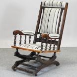 An early 20th century American style rocking chair