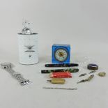A collection of items to include two Parker fountain pens, a Police wristwatch, Swarovski model,