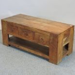 A hardwood eastern coffee table,