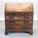 A George III mahogany bureau,