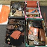 Four boxes of items, to include a military cup, wooden items,