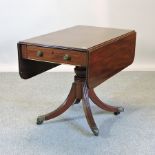 A Regency mahogany pembroke table, the frieze containing a single drawer, on a quadruped base,