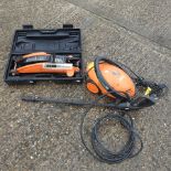 An RAC pressure washer, together with a trolley jack,