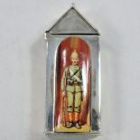 A modern sterling silver and enamel vesta, painted with a soldier, in the form of a sentry box,