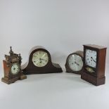 A collection of four mantel clocks, one having Westminster chimes,