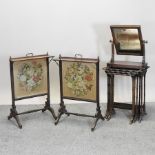 A pair of Victorian rosewood fire screens, each with a tapestry inset, 52cm,