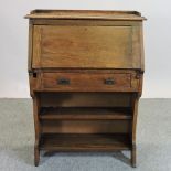 A 1920's oak student's bureau,