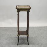 A French empire style side table, with a marble top,