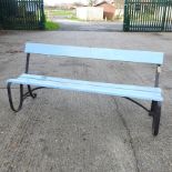 A blue painted and iron garden bench,