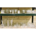 Two shelves of glassware,