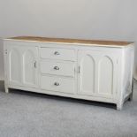 A Victorian white painted pine sideboard,