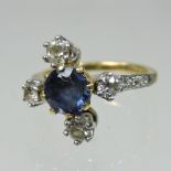 An 18 carat gold, sapphire and diamond five stone cluster ring,