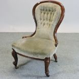 A Victorian beige upholstered spoon back nursing chair