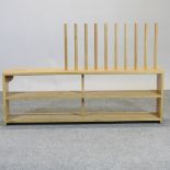 A modern light oak boot rack,