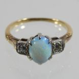 An 18 carat gold opal and diamond cluster ring,