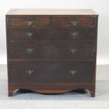 A George III oak chest, containing two short over three long drawers.