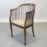 An Edwardian mahogany and inlaid desk chair