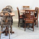 A refectory table, 122 x 69cm, together with a set of six fiddle back dining chairs,