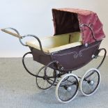 A vintage child's toy pram,