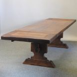 A large oak refectory style dining table,