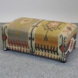 A Kelim upholstered footstool,