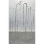 A blue painted folding garden screen,