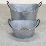 A large oval metal planter, 62cm,