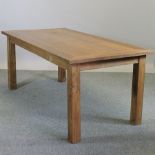 A rustic teak dining table,