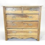 An Edwardian satin walnut chest of drawers,