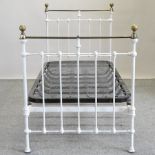 A brass and iron white painted single bed, with spring base,