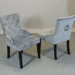 A pair of grey upholstered side chairs