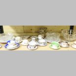 A shelf of decorative china,