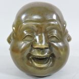 A brass four face buddha,