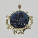 An unmarked sapphire pendant, carved with a cameo portrait bust of a military figure,