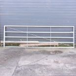A galvanised metal field gate, 360cm,